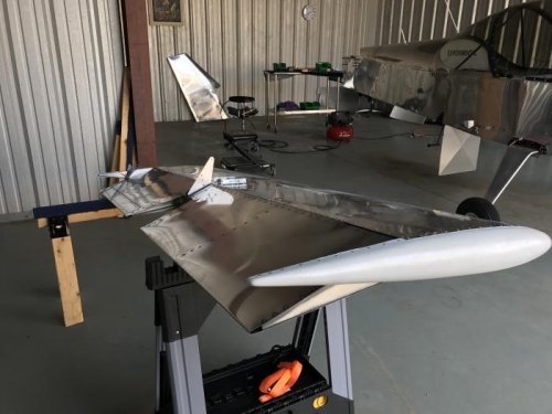 Completed horizontal tail with both tips, the elevator, and 2 saddle brackets riveted in place.
