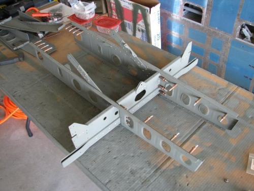 inboard fore and aft ribs clecoed to the spar attach.