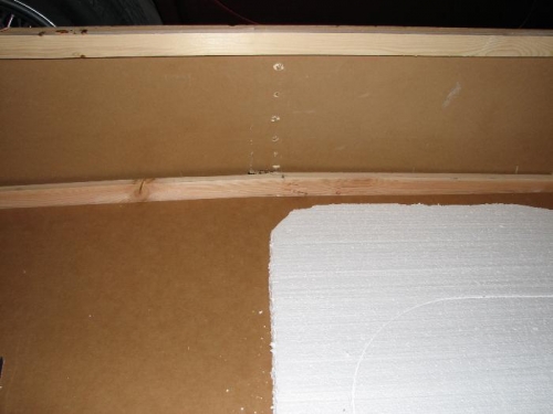 Damage to lower edge of the crate.
