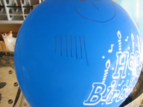 Lines on the ballon help gauge any leak.