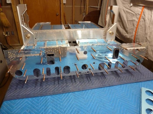 bulkhead clecoed to seat floor
