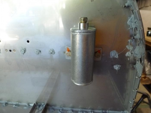 reservoir in engine compart.