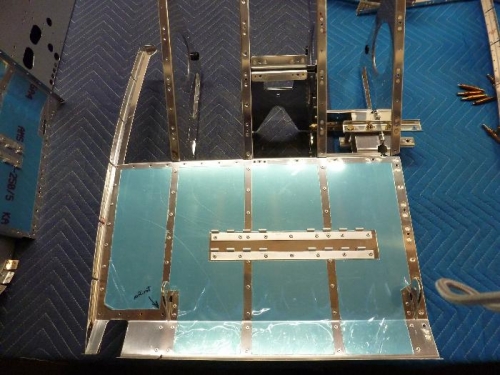 finished left seat floor assembly