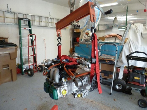 engine hanging from the hoist