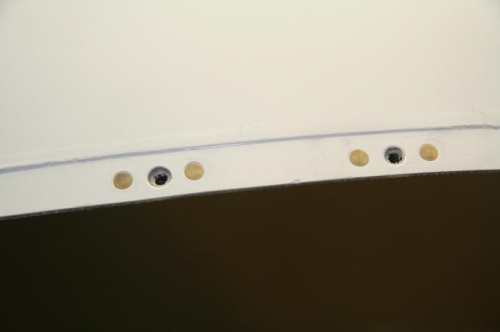 close up of platenuts and rivets