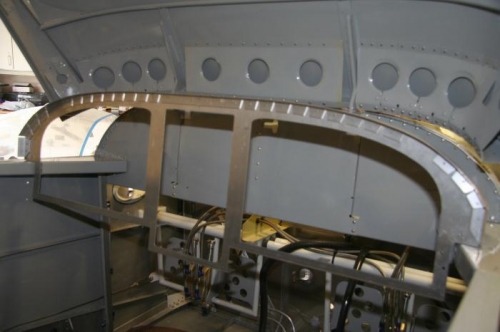 Frame attached to fuselage