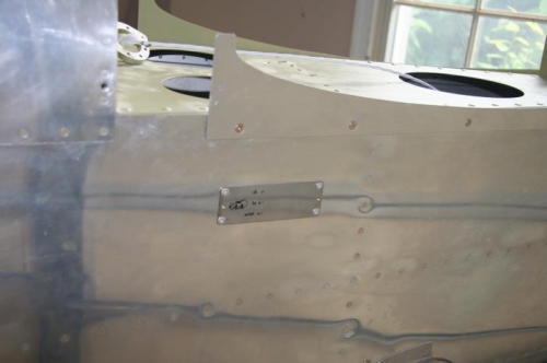 Data plate riveted on fuselage