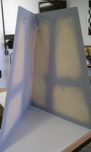 Primed only where the skin contacts the flanges