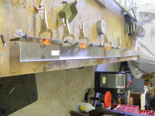 clamping L's to top web of spar