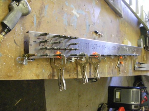 Rear spar turned over to drill