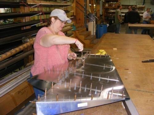 Half riveted, trade clecos for more rivets