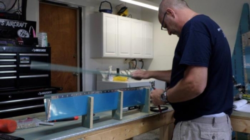 Riveting trim tab skins