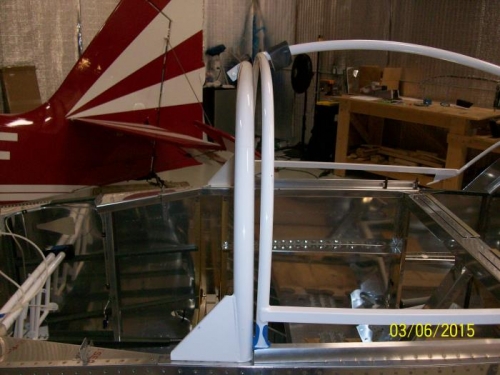Roll bar to canopy frame
