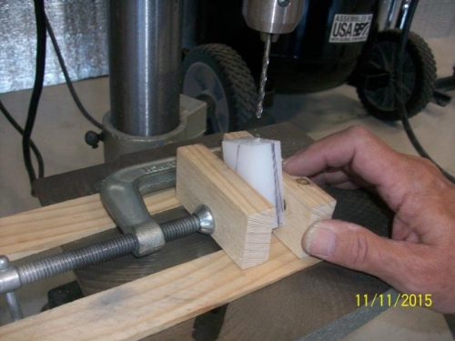 Anchor block jigged for drilling