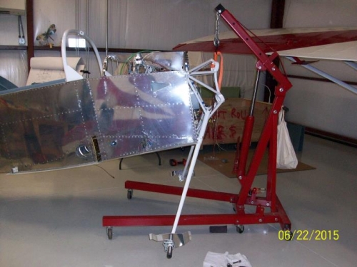 Using motor hoist to lift fuselage
