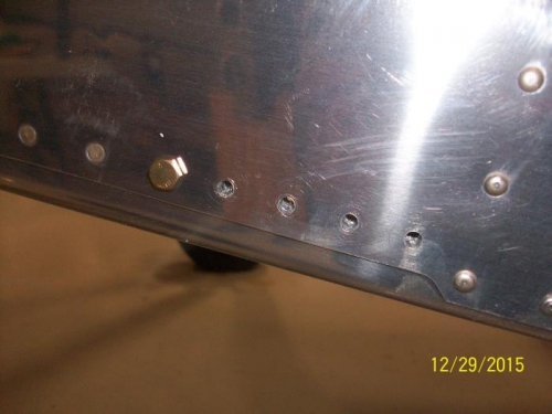 Holes drilled in fuselage for gusset attach