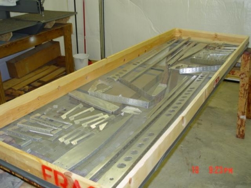 The elevator parts laid out in spray table