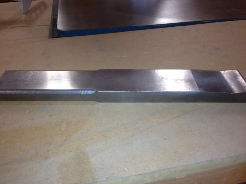 Bucking bar for rear spar