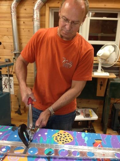 Dimpling holes in flange of spar