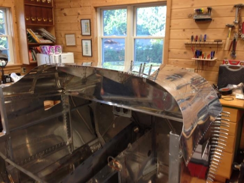 Skin riveted in place