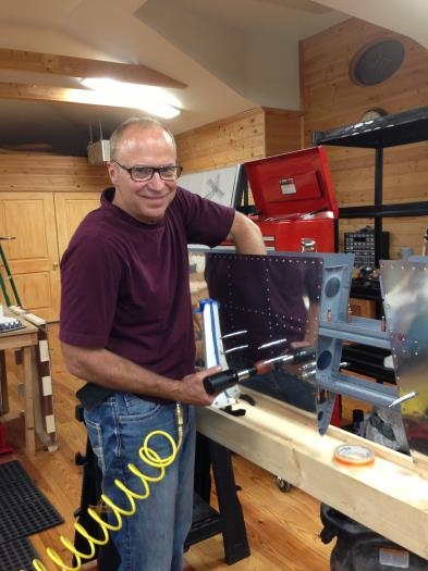 Riveting the skins to the front spar