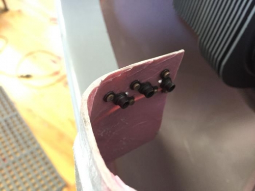 Nutplates at center cowl