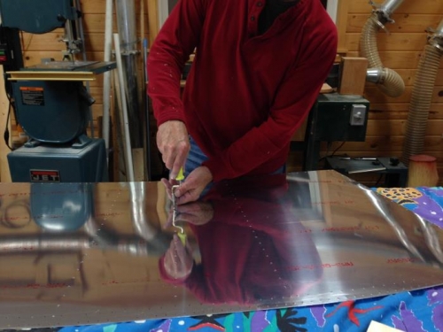 Deburring top skin of tailcone