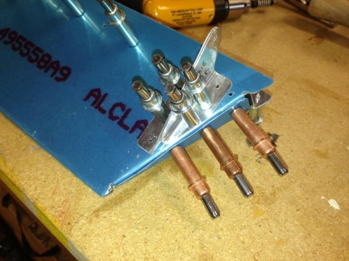 Trim tab horns clecoed