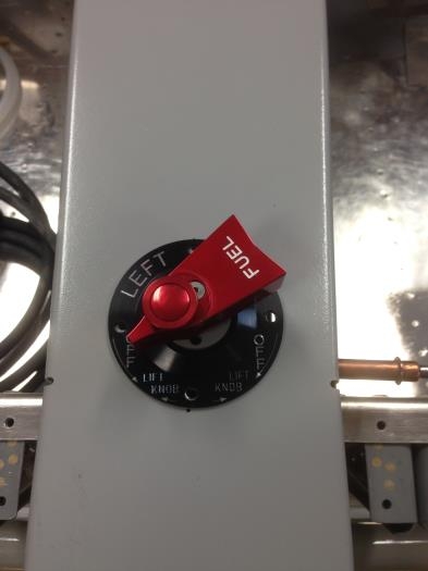 Fuel valve seated on deck over tunnel