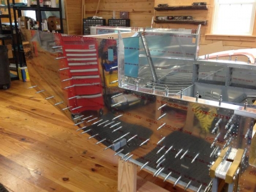 Attachment of mid side skins