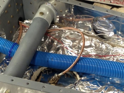 insulation, coax to com and conduit under baggage floor