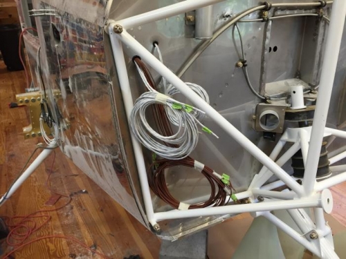 Wires run to engine compartment from engine interface module