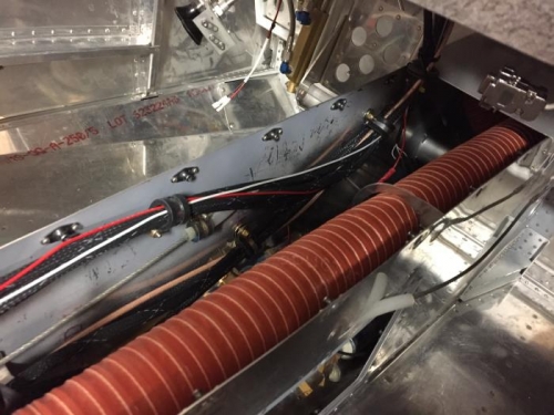 Headset harnesses along left side of tunnel