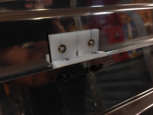 Wear blocks for rear seat belt cables