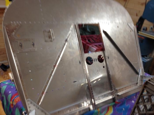 Began riveting angles to firewall