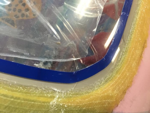 Cured cloth and epoxy