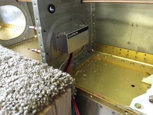 Control box mounted to rib