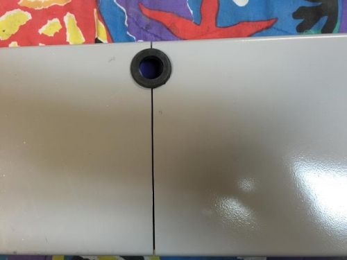 Further aft in fuselage