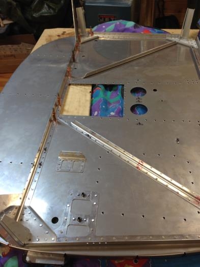 Riveting channels onto firewall