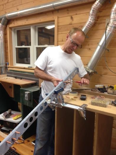 Adding hinge reinforcement plates to front spar