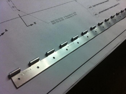 First hinge drilled with fixture