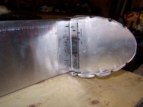 End rib, with L-bracket and hinge pin