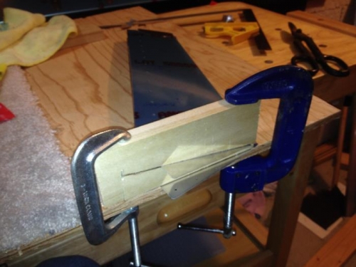 Clamped on the bench and ready to bend the tabs.