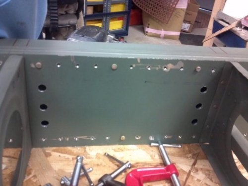 screw access holes for tank mounts