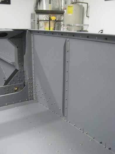 Primed and installed right F1256 skin stiffener