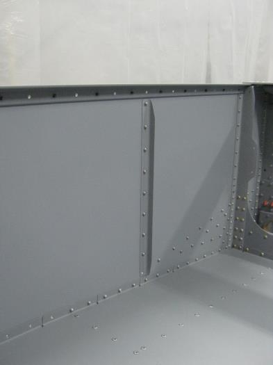 Primed and installed left F1256 skin stiffener