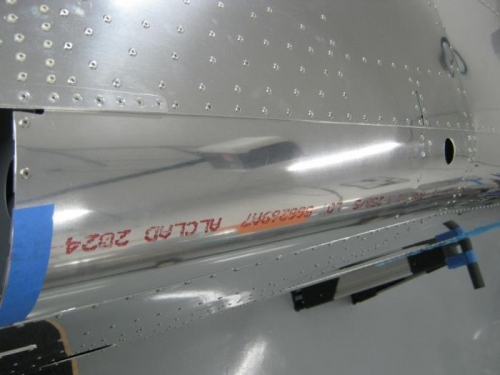 Left corner skin installed and riveted.  Right finished as well, but no picture