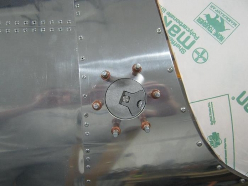 Fuel filler neck postitioned and attachment holes drilled.