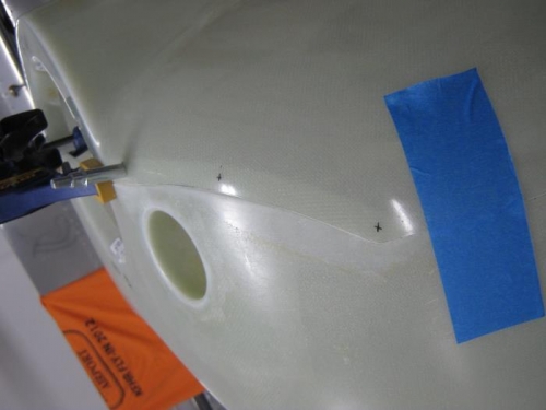 Attachment screw hole location identified-left side.