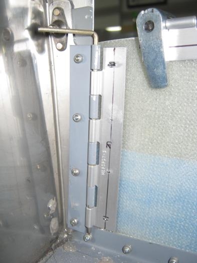 Mid-cowl hinge shown attached in place